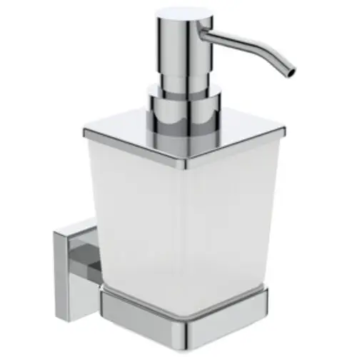 Lotionspender aus transparentem Material mit chromfarbener Pumpe, montierbar an der Wand. Produkt von Ideal Standard.